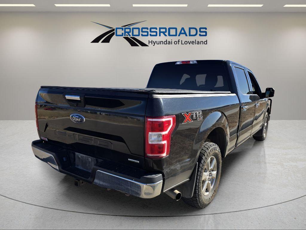 used 2018 Ford F-150 car, priced at $13,896