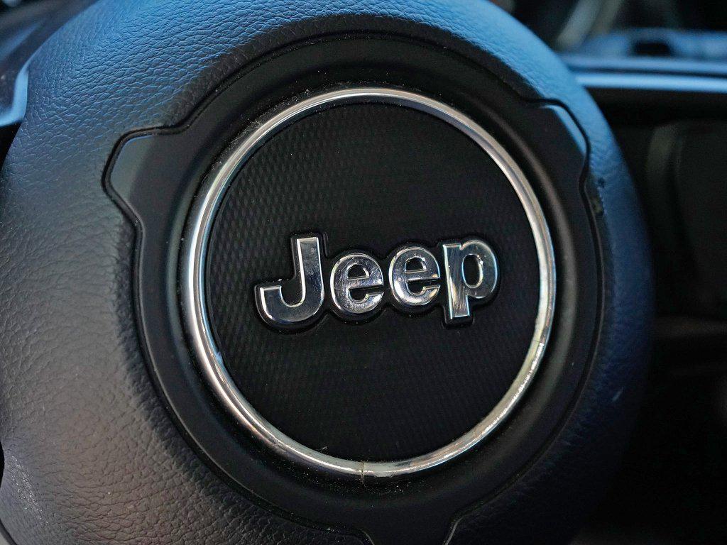 used 2021 Jeep Wrangler Unlimited car, priced at $22,954