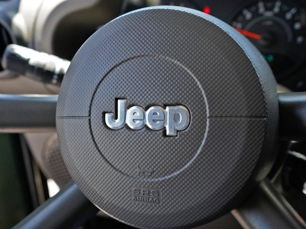 used 2009 Jeep Wrangler Unlimited car, priced at $14,676