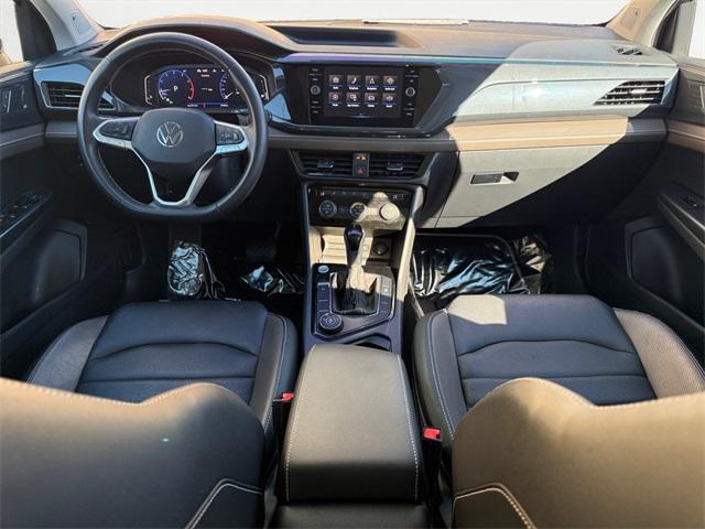 used 2023 Volkswagen Taos car, priced at $20,690