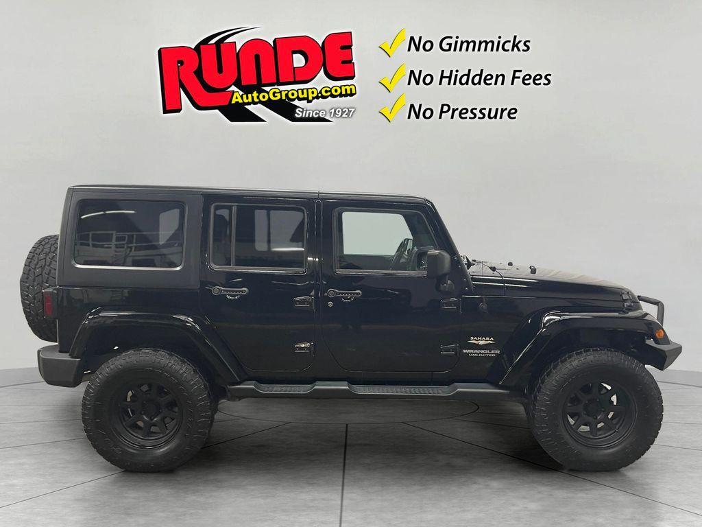 used 2015 Jeep Wrangler Unlimited car, priced at $17,781