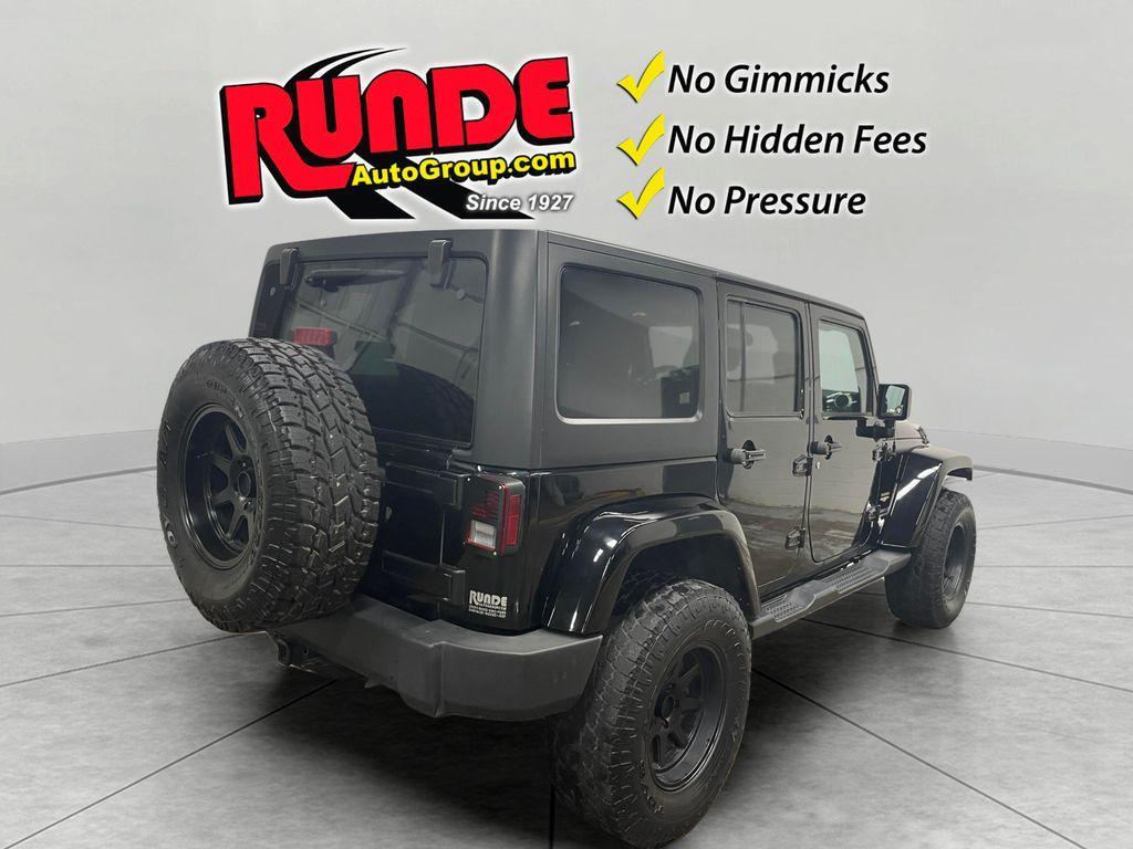 used 2015 Jeep Wrangler Unlimited car, priced at $17,781