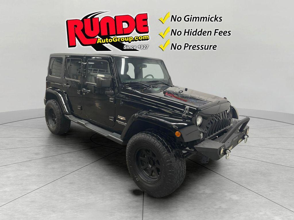 used 2015 Jeep Wrangler Unlimited car, priced at $17,781