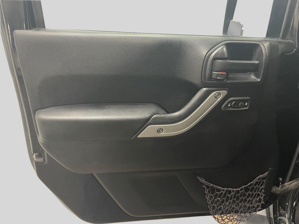 used 2015 Jeep Wrangler Unlimited car, priced at $17,781