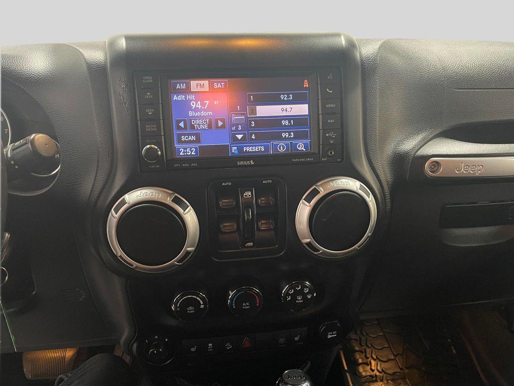 used 2015 Jeep Wrangler Unlimited car, priced at $17,781