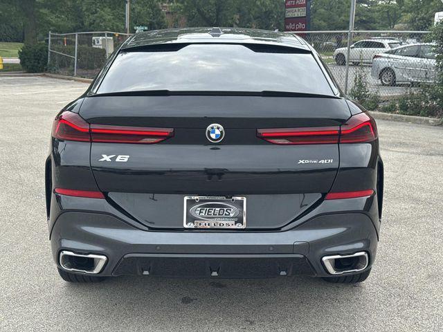 used 2025 BMW X6 car, priced at $57,372
