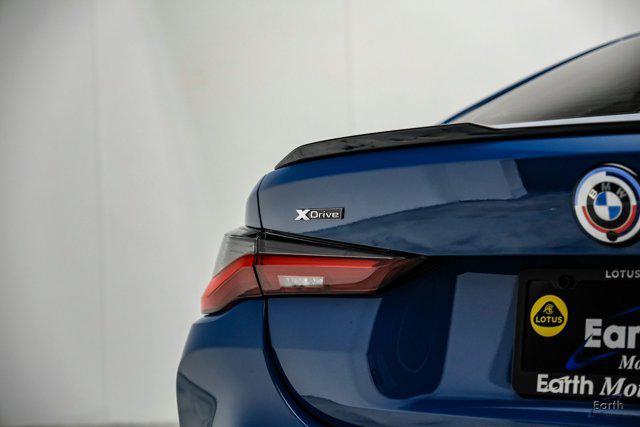 used 2023 BMW M4 car, priced at $80,385