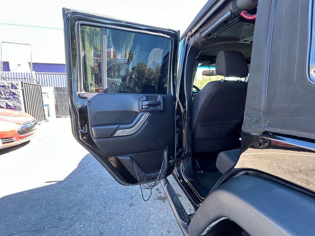used 2015 Jeep Wrangler Unlimited car, priced at $15,212