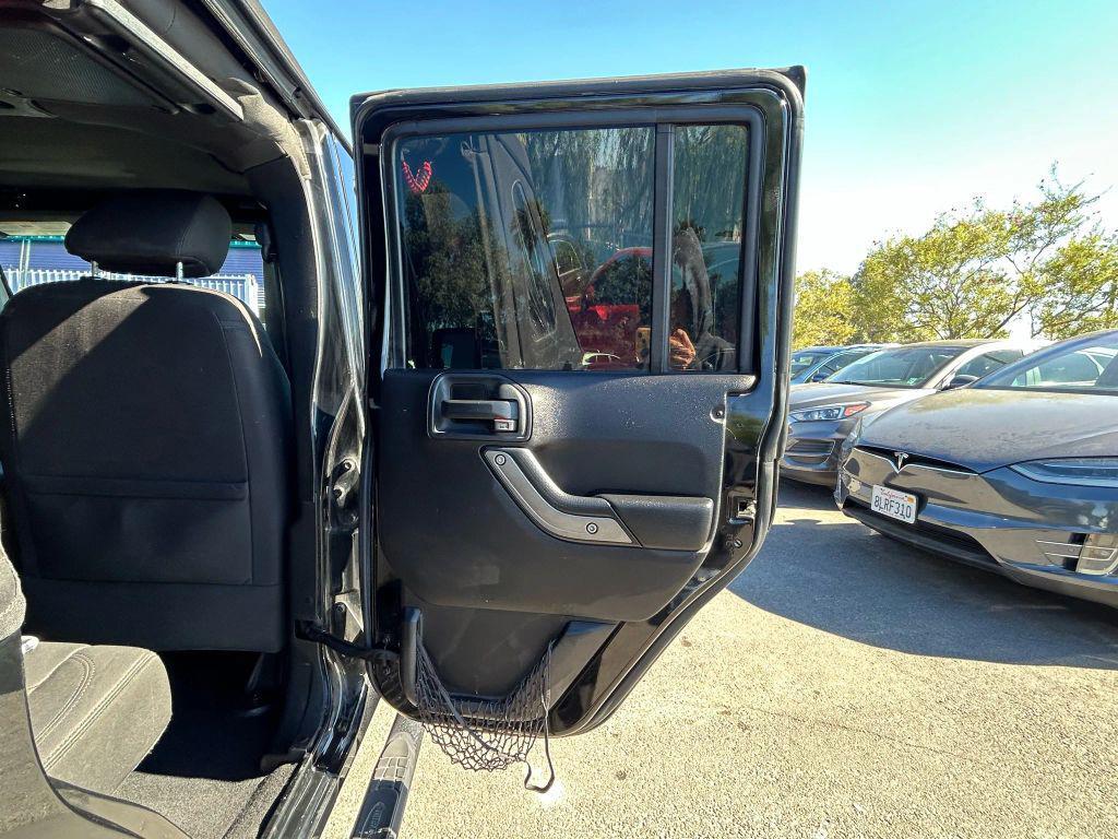 used 2015 Jeep Wrangler Unlimited car, priced at $15,212
