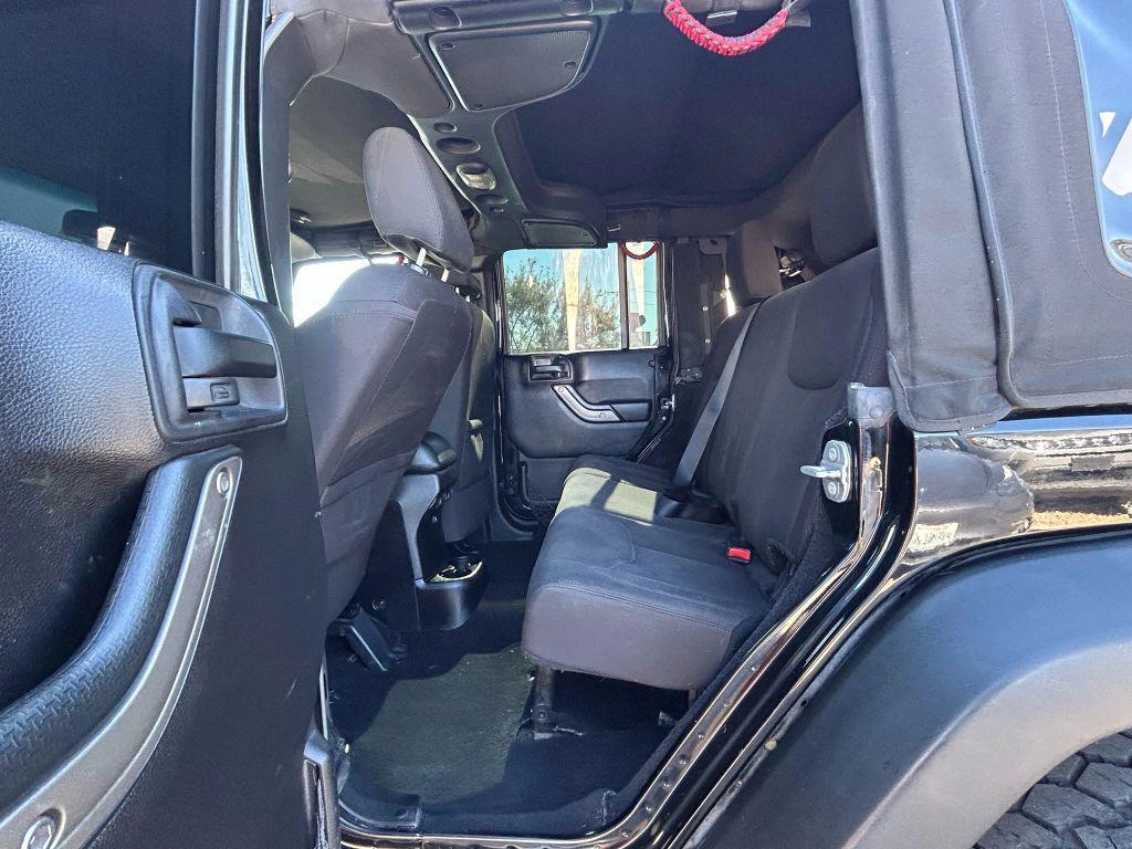 used 2015 Jeep Wrangler Unlimited car, priced at $15,212