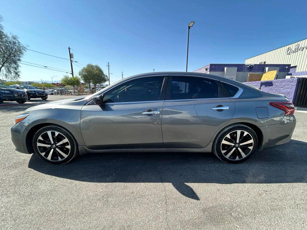 used 2018 Nissan Altima car, priced at $9,000