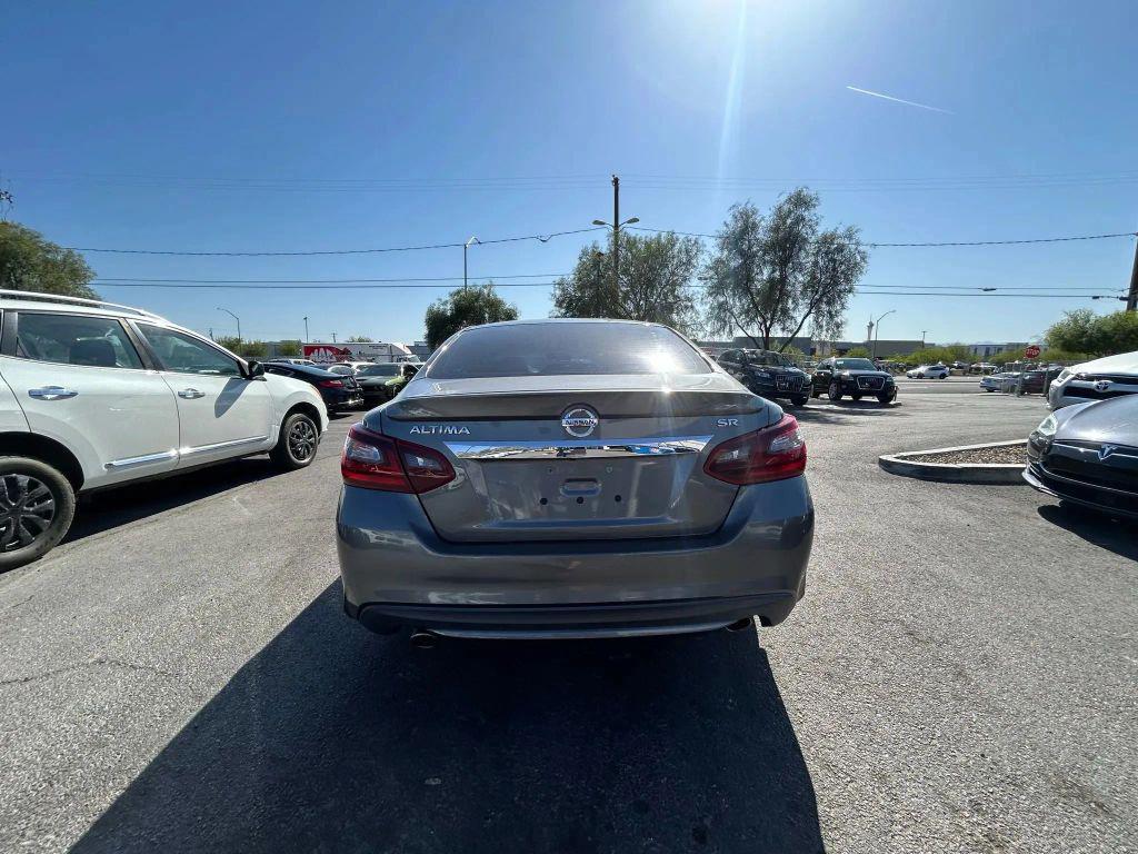 used 2018 Nissan Altima car, priced at $9,000