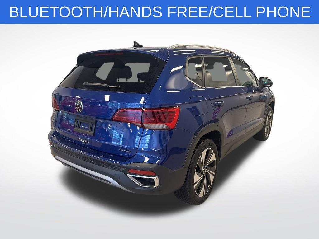 used 2023 Volkswagen Taos car, priced at $21,284