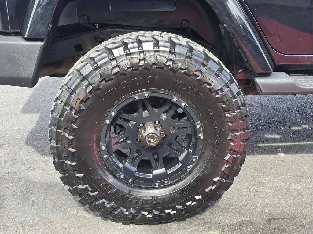 used 2011 Jeep Wrangler Unlimited car, priced at $15,997