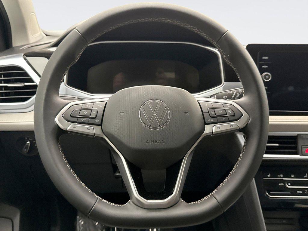 used 2025 Volkswagen Taos car, priced at $24,698