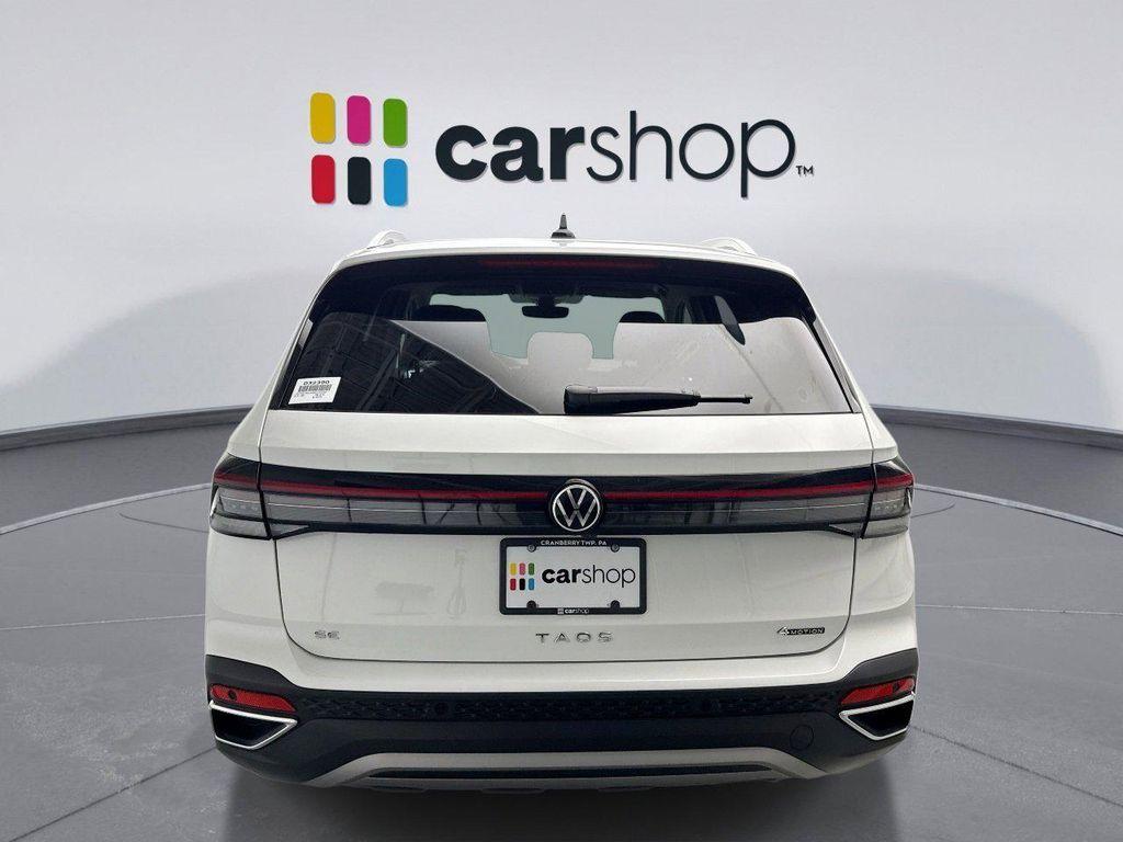 used 2025 Volkswagen Taos car, priced at $24,698