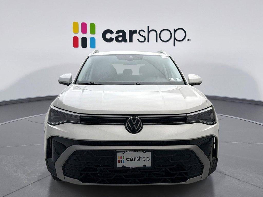 used 2025 Volkswagen Taos car, priced at $24,698