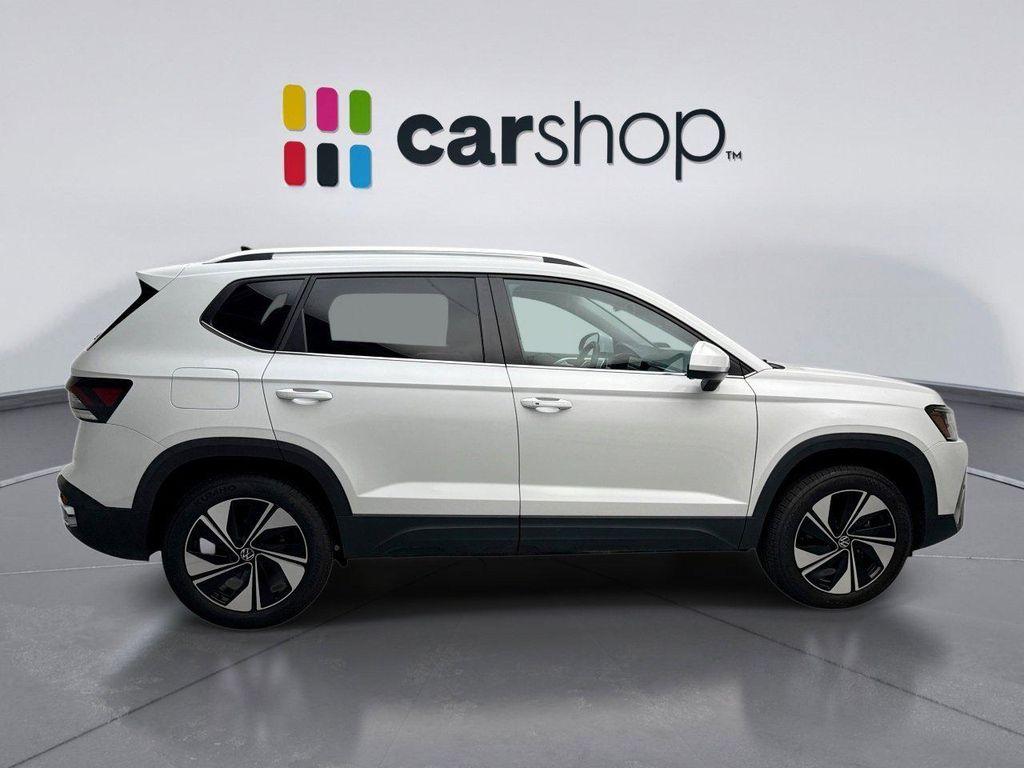 used 2025 Volkswagen Taos car, priced at $24,698