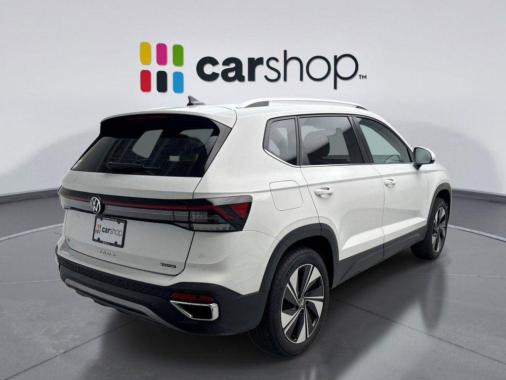 used 2025 Volkswagen Taos car, priced at $24,698
