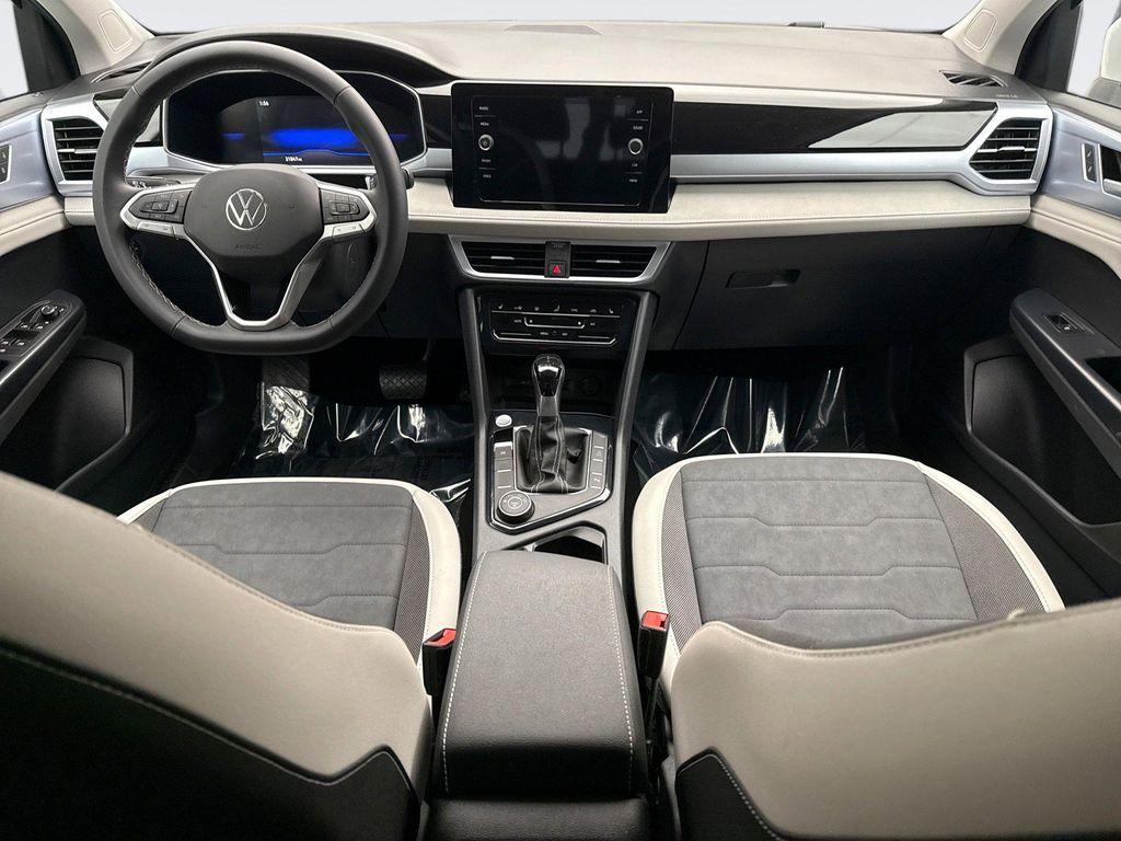 used 2025 Volkswagen Taos car, priced at $24,698