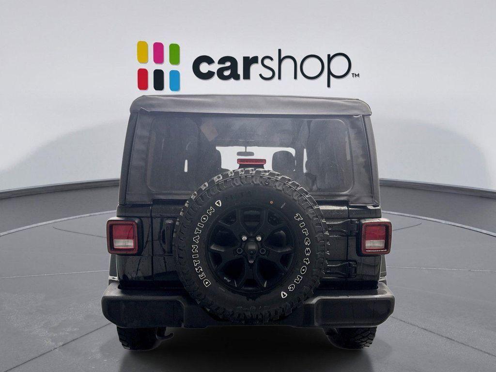 used 2023 Jeep Wrangler car, priced at $31,999