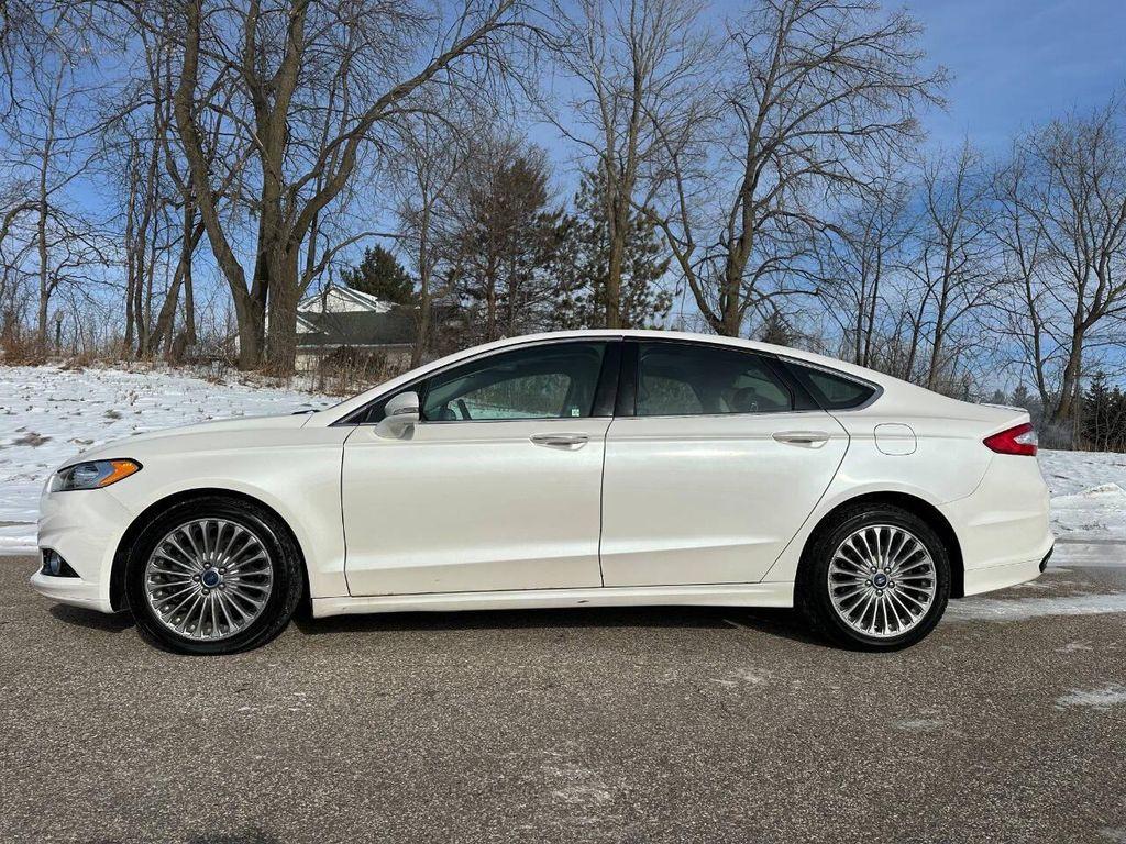 used 2016 Ford Fusion car, priced at $6,900