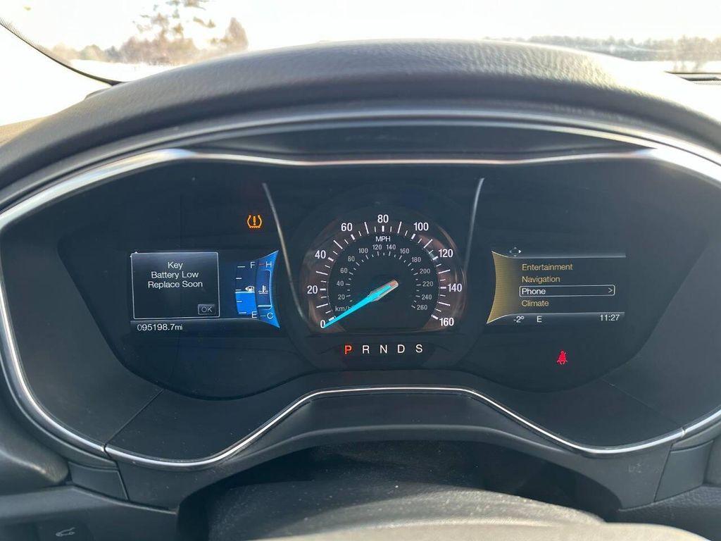 used 2016 Ford Fusion car, priced at $6,900