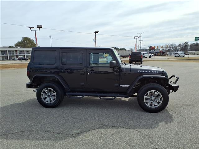used 2013 Jeep Wrangler Unlimited car, priced at $14,988