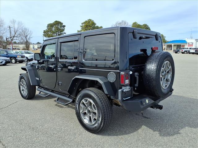 used 2013 Jeep Wrangler Unlimited car, priced at $14,988