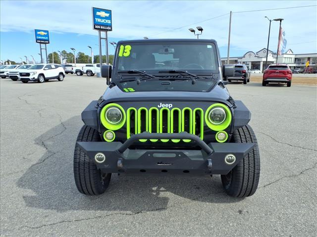 used 2013 Jeep Wrangler Unlimited car, priced at $14,988