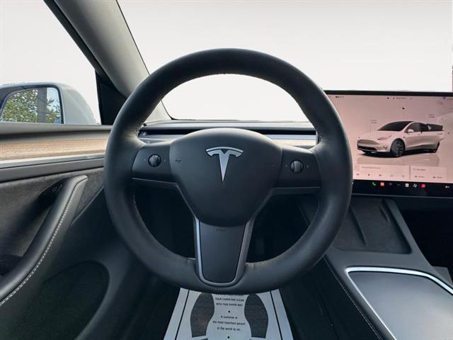 used 2023 Tesla Model Y car, priced at $29,999