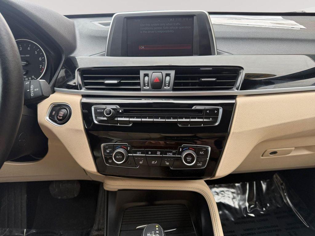 used 2018 BMW X1 car, priced at $15,874