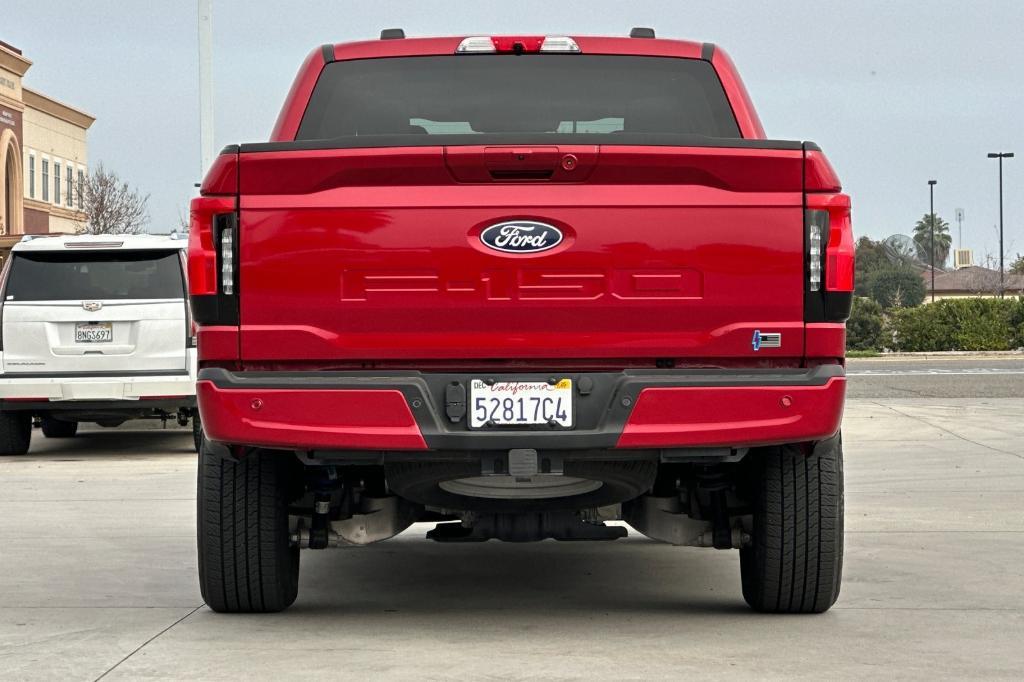 used 2024 Ford F-150 Lightning car, priced at $47,804