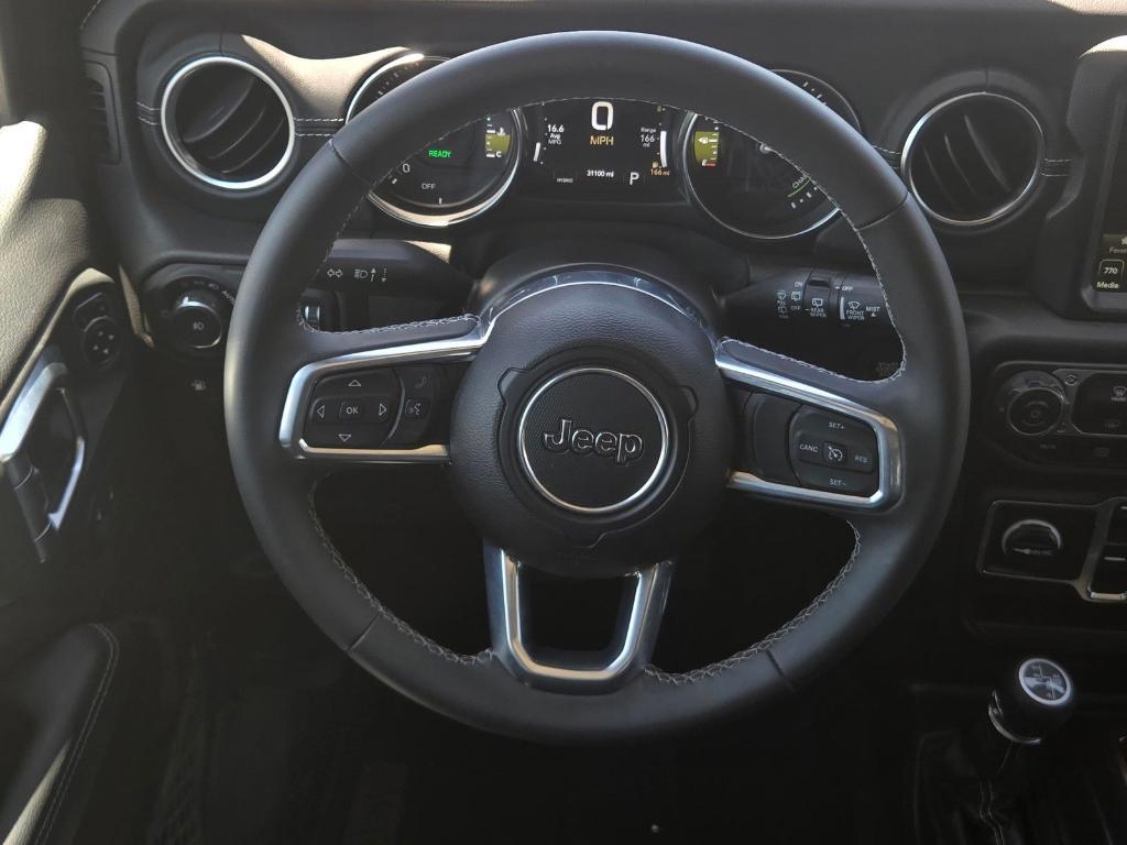 used 2023 Jeep Wrangler 4xe car, priced at $29,964