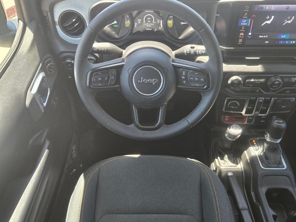 used 2025 Jeep Wrangler 4xe car, priced at $28,386