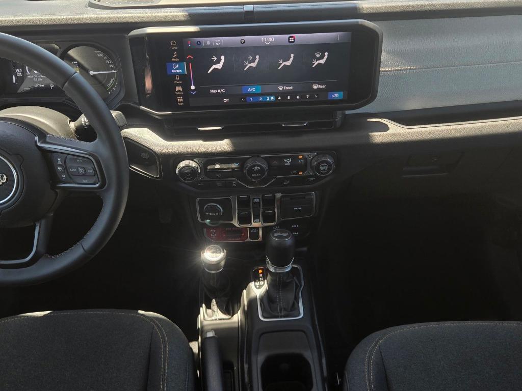 used 2025 Jeep Wrangler 4xe car, priced at $28,386