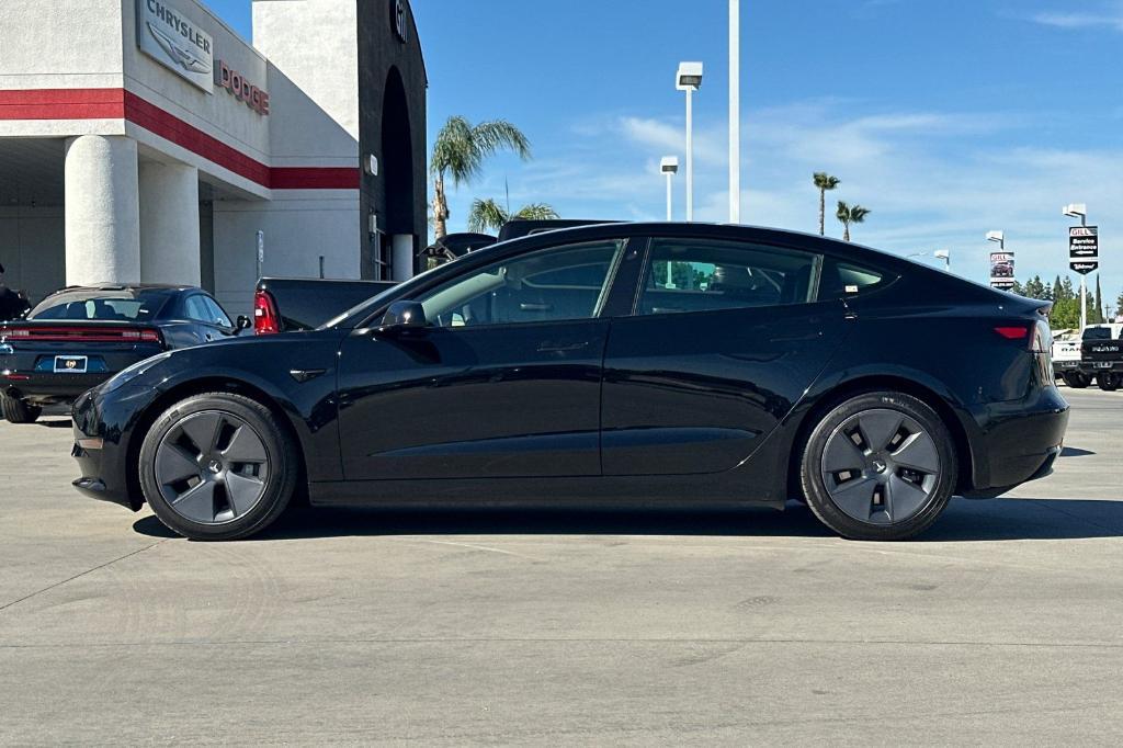 used 2023 Tesla Model 3 car, priced at $24,755
