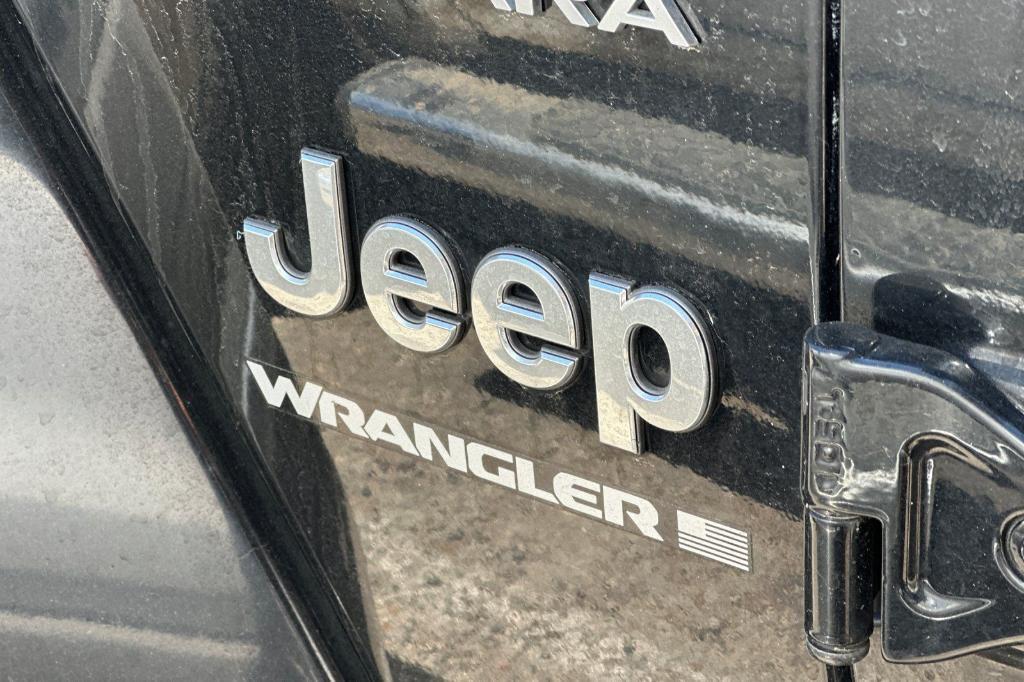 used 2023 Jeep Wrangler car, priced at $28,624