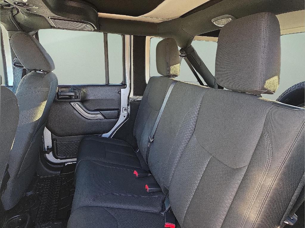 used 2016 Jeep Wrangler Unlimited car, priced at $19,368