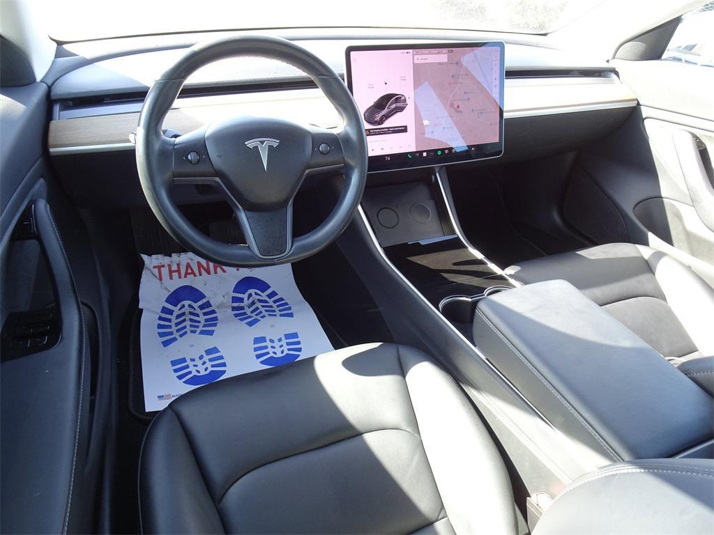 used 2018 Tesla Model 3 car, priced at $15,000