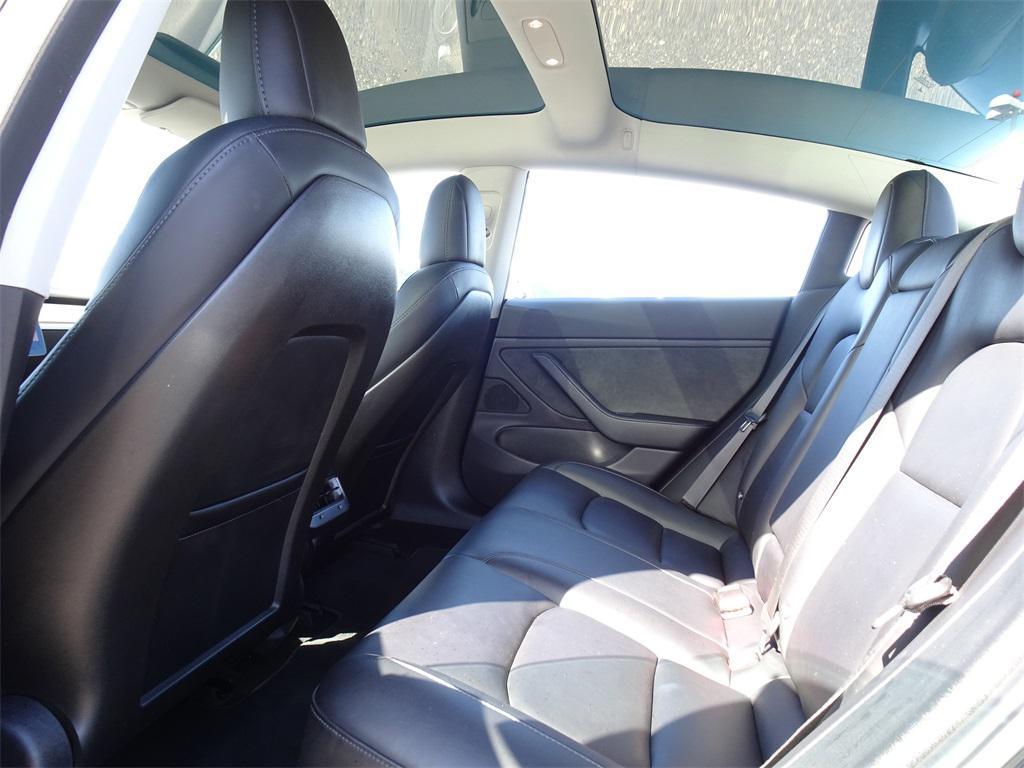 used 2018 Tesla Model 3 car, priced at $15,000