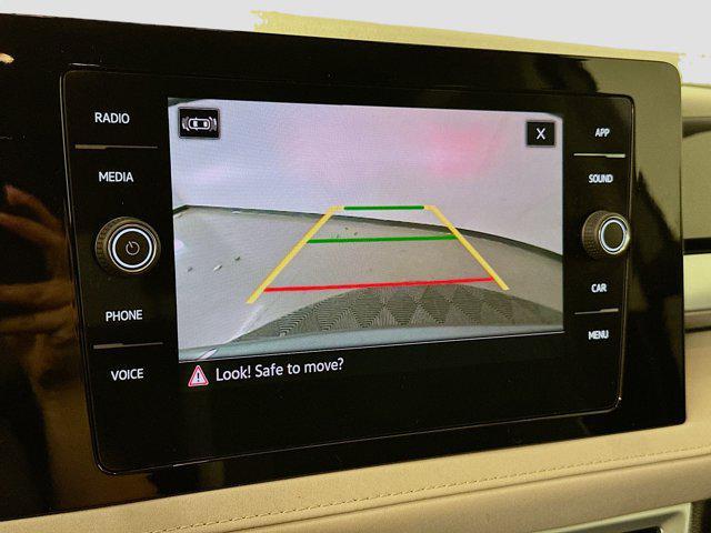 used 2025 Volkswagen Taos car, priced at $22,487