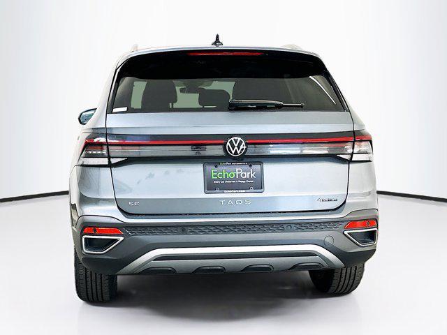 used 2025 Volkswagen Taos car, priced at $22,487