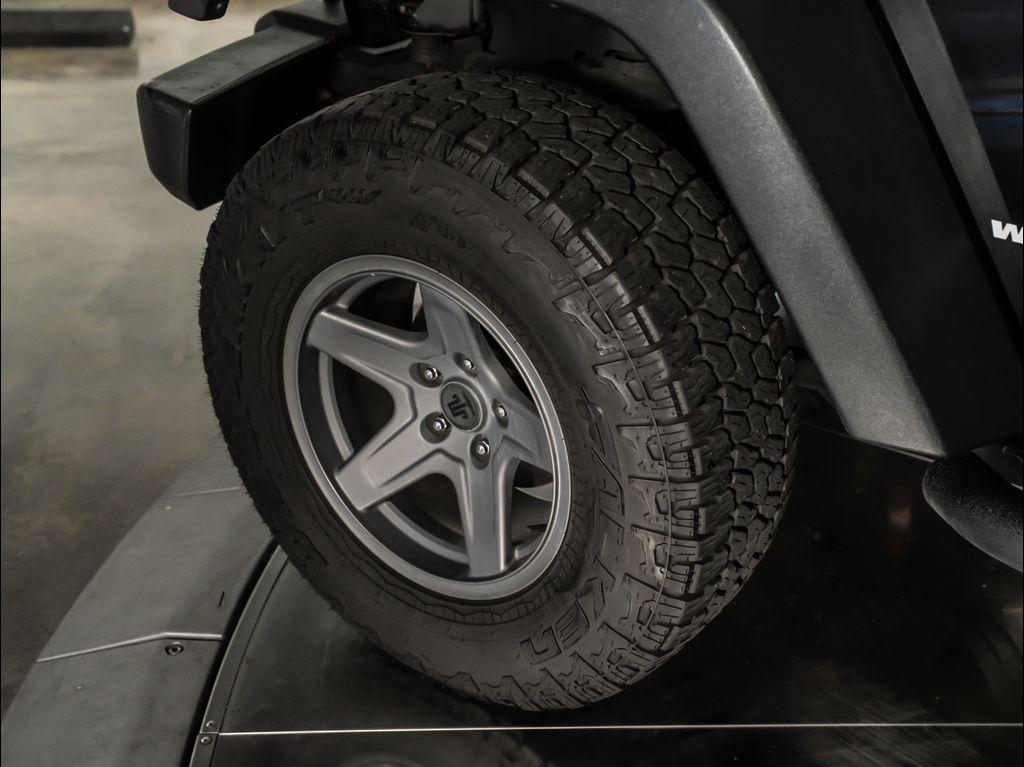 used 2015 Jeep Wrangler Unlimited car, priced at $21,995