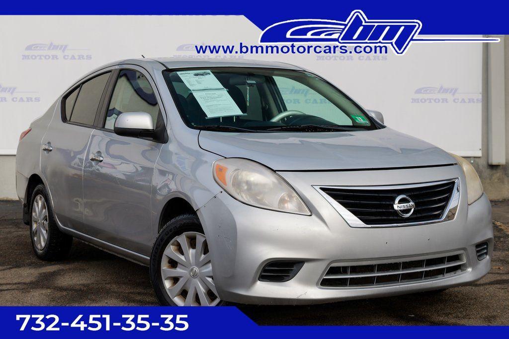 used 2012 Nissan Versa car, priced at $3,900