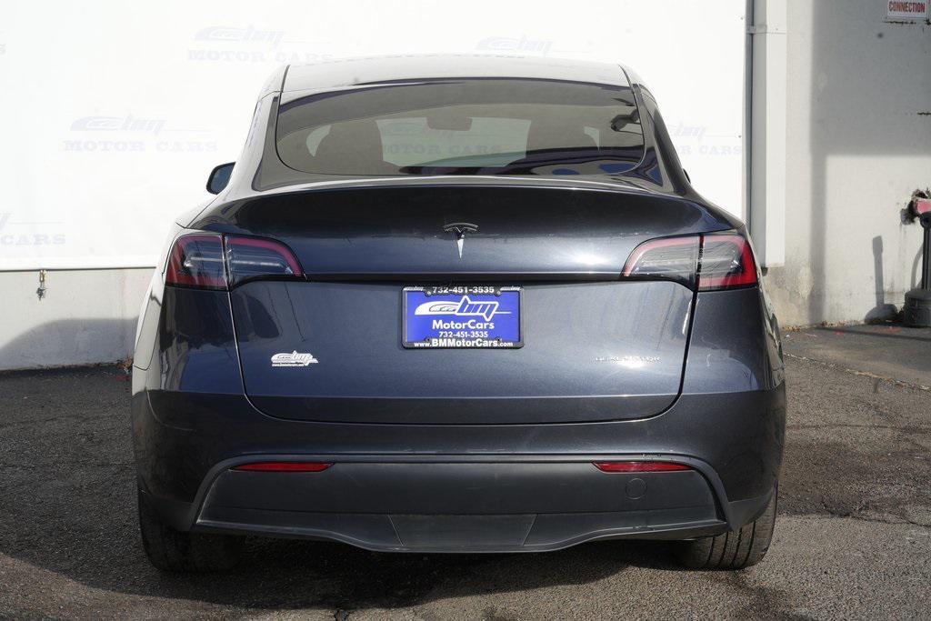 used 2025 Tesla Model Y car, priced at $36,900
