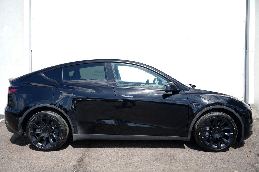 used 2023 Tesla Model Y car, priced at $29,900