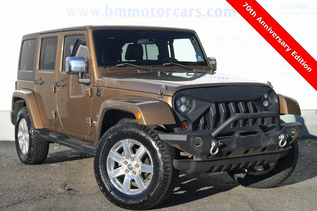 used 2011 Jeep Wrangler Unlimited car, priced at $9,900