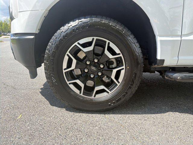 used 2022 Ford F-150 Lightning car, priced at $32,500