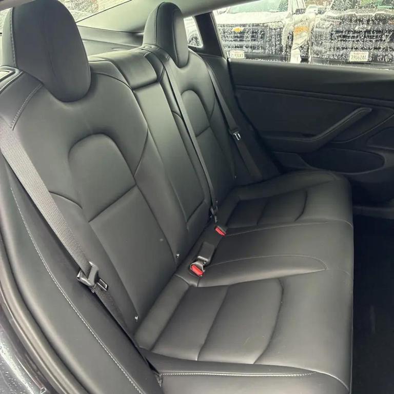 used 2018 Tesla Model 3 car, priced at $18,495